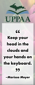 UPPAA A motivational bookmark featuring a quote by marissa meyer, "keep your head in the clouds and your hands on the keyboard," with the uppaa logo at the top. the background includes a floral design.